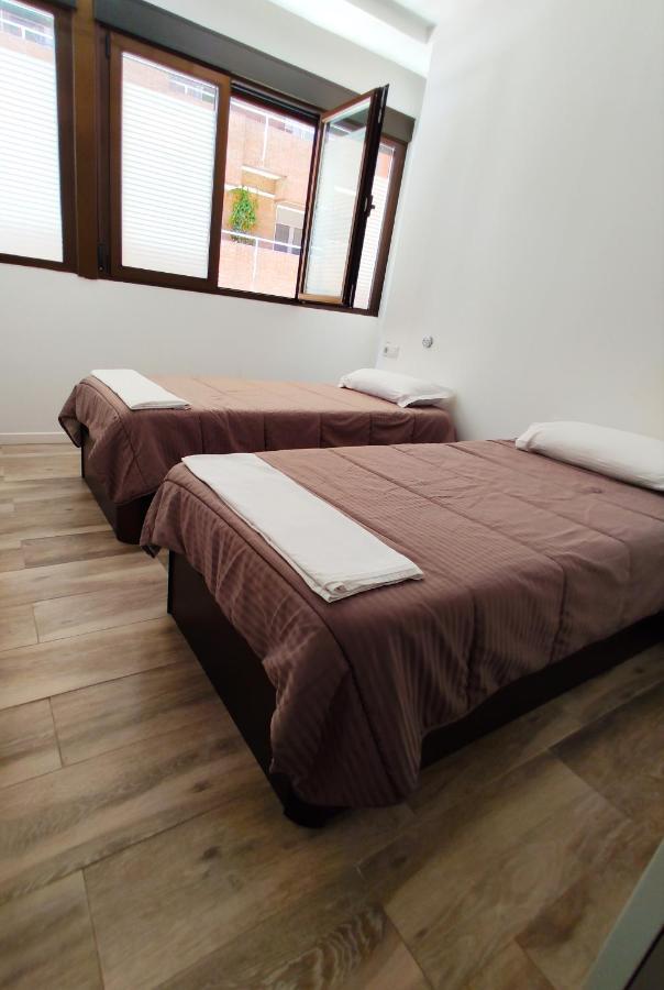Habitación Doble con baño privado - 2 camas